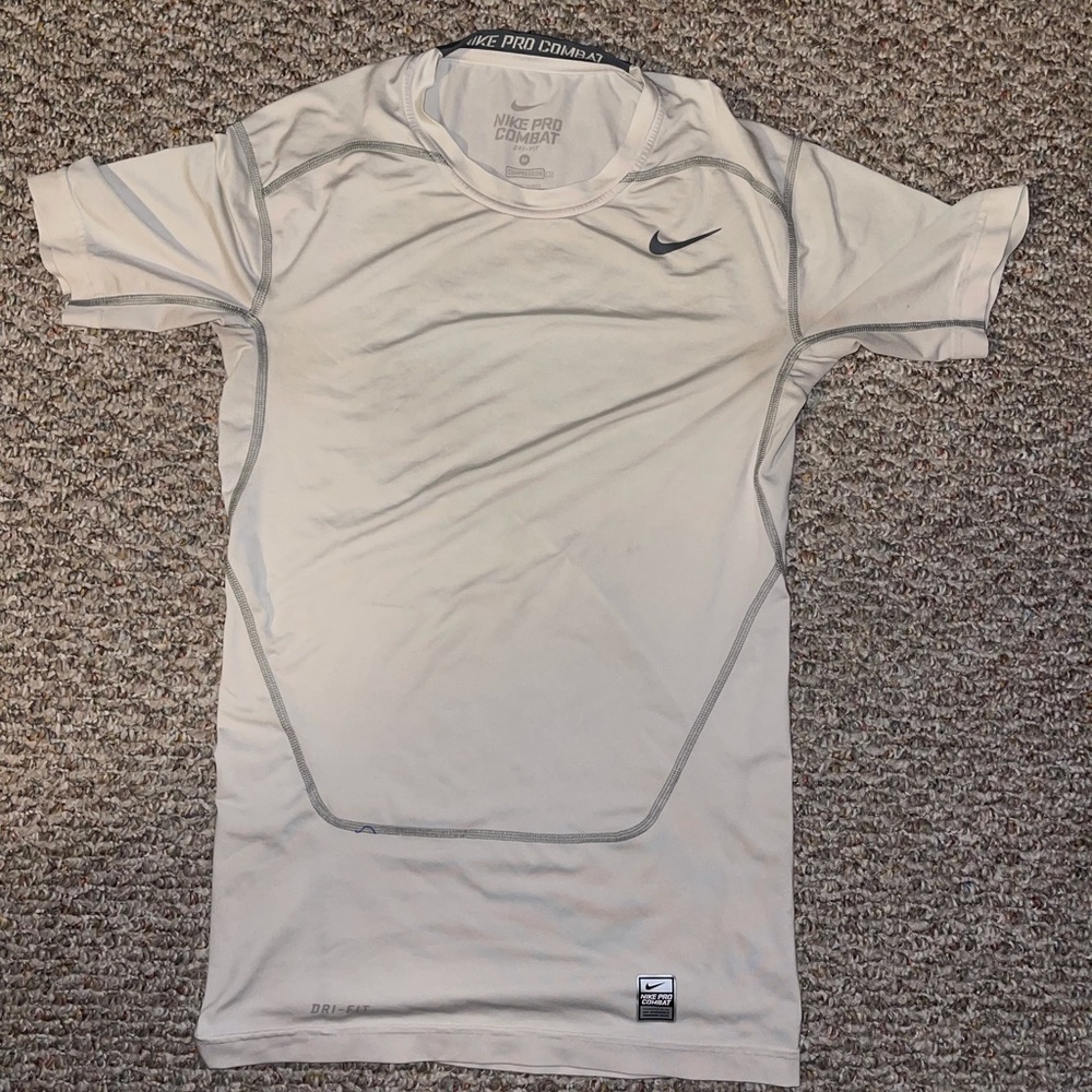 Nike football pro combat fitted shirt.